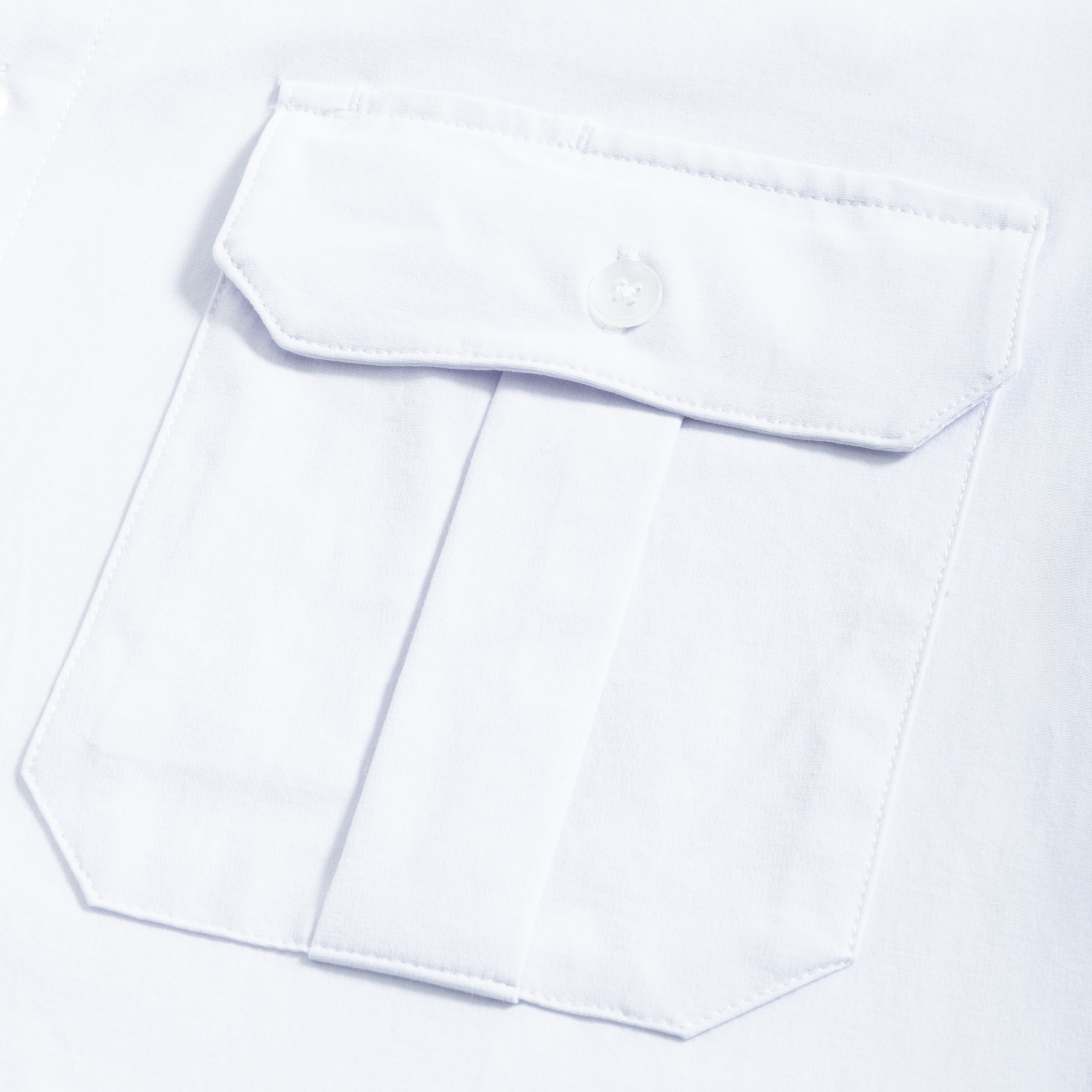 Detail shot of Cloud Cotton pilot shirt pleated chest pocket with button flap